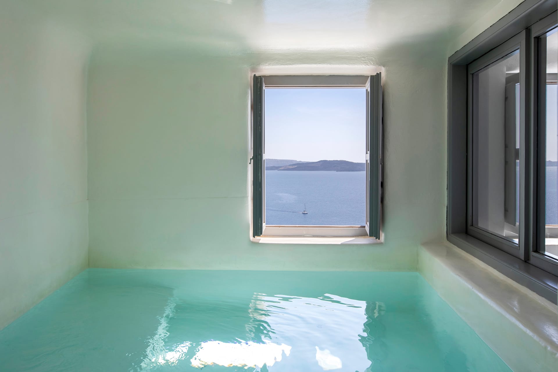 Deluxe Suite with Indoor Plunge Pool and Caldera View