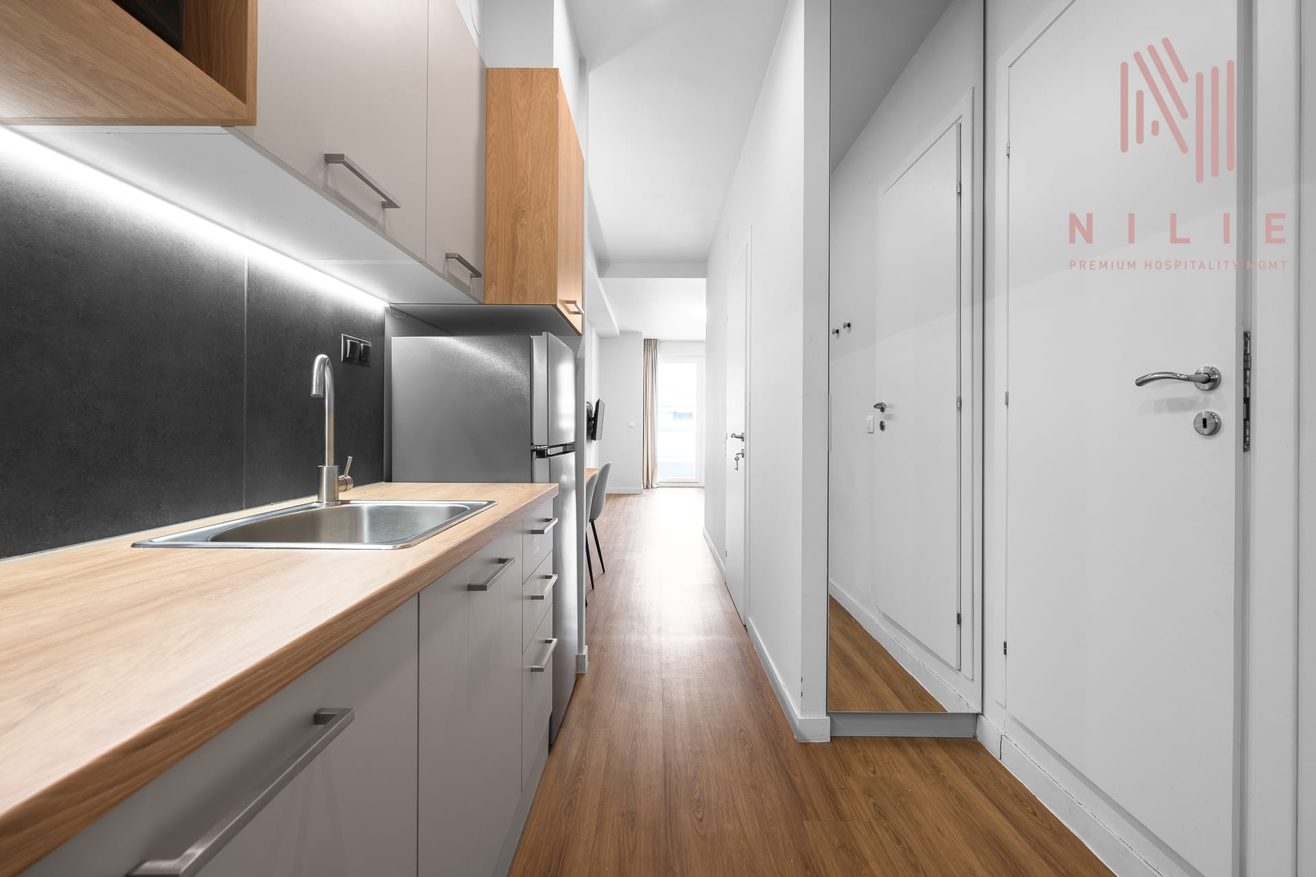 NILIE PREMIUM HOSPITALITY MGMT - 6BA10 - 7