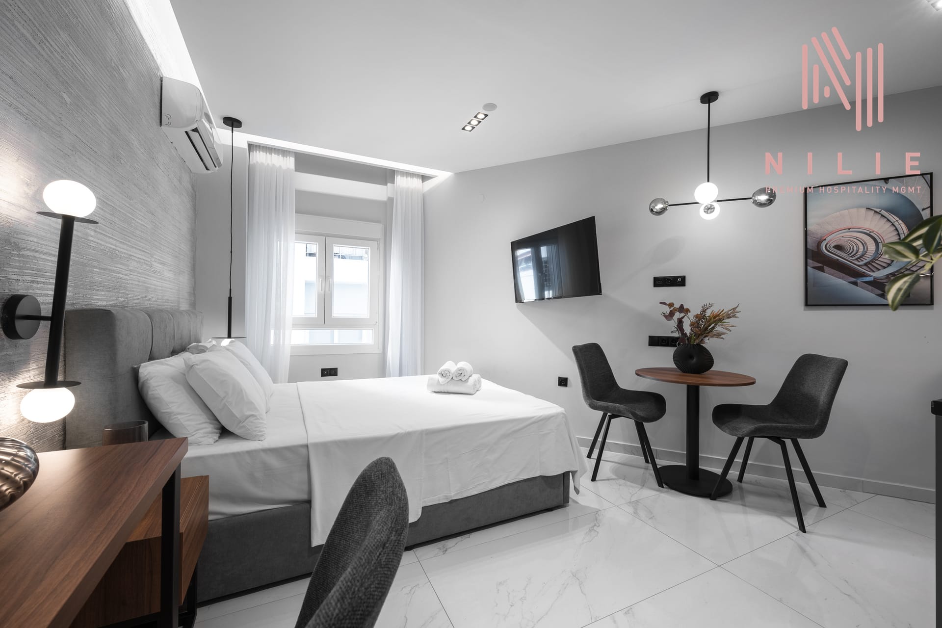 NILIE PREMIUM HOSPITALITY MGMT - AGIA5 - 2