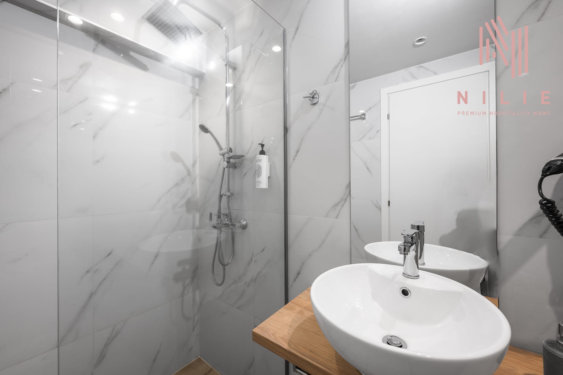 NILIE PREMIUM HOSPITALITY MGMT - 7BA4 - 18