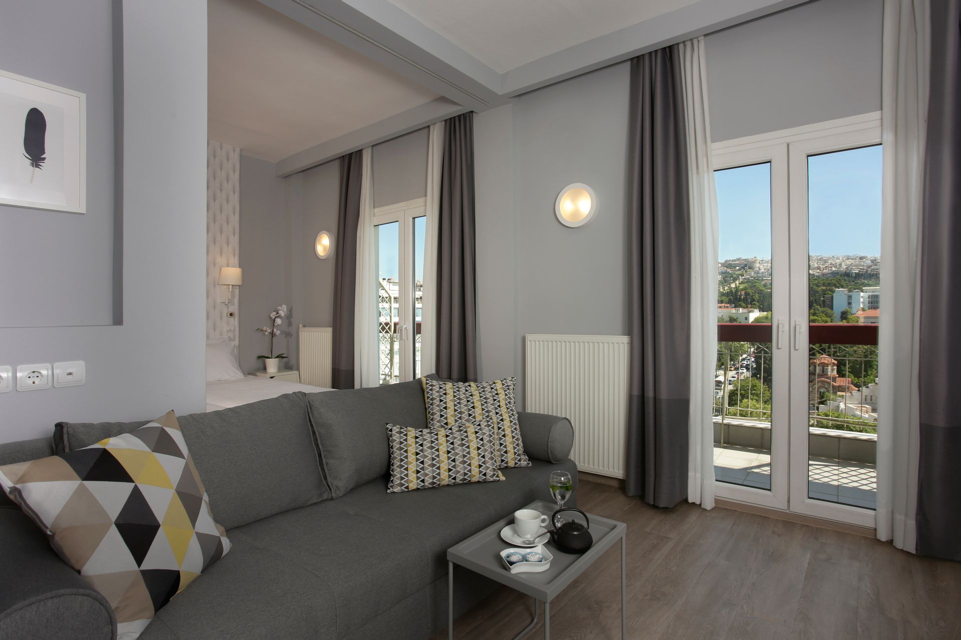 Quadraple Room with Balcony & City View
